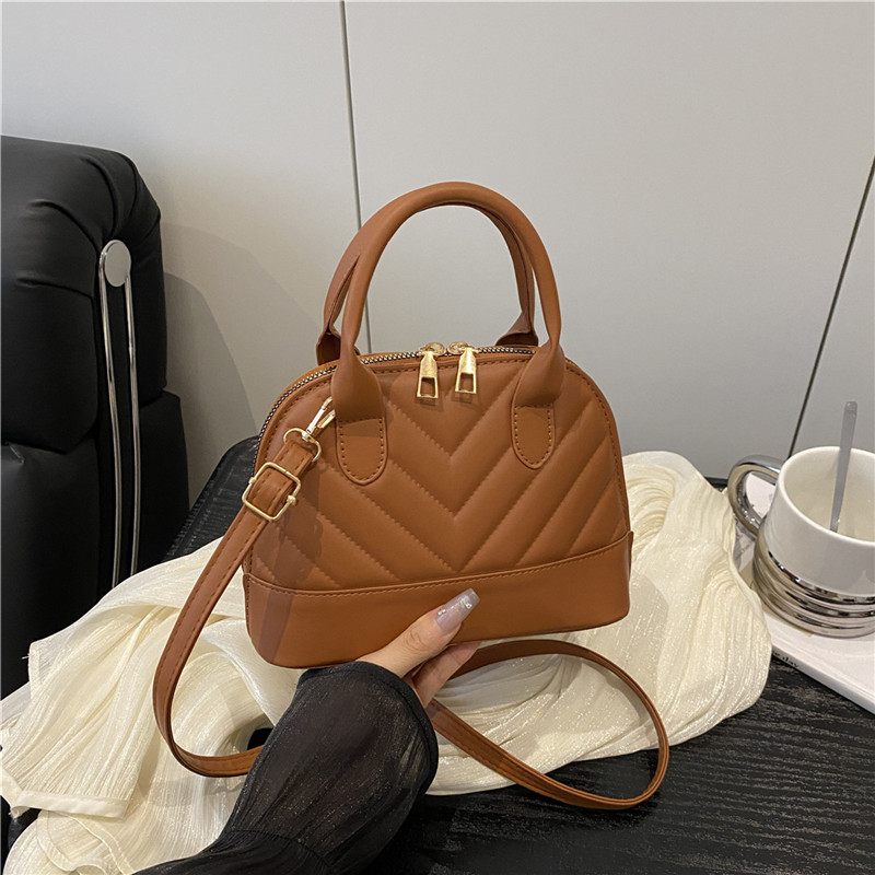 Geantă de tip cochilie, în stil stradal, din PU, închidere cu fermoar, fără căptușeală, pentru uz zilnic — Jinhe Tang Chao JS9950, Vara 2025