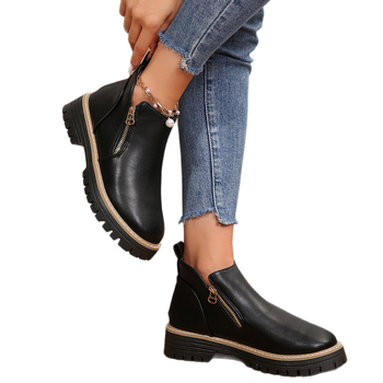 Női Martin csizmák: felső rész szintetikus bőrből, kerek orr, oldalsó cipzár, alacsony szár, vastag sarok