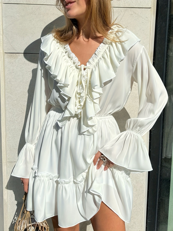 Poliészterből készült ruha hosszú ujjúval, V-nyakkal, elasztikus derékkal és fodros lótuszlevél szoknyával