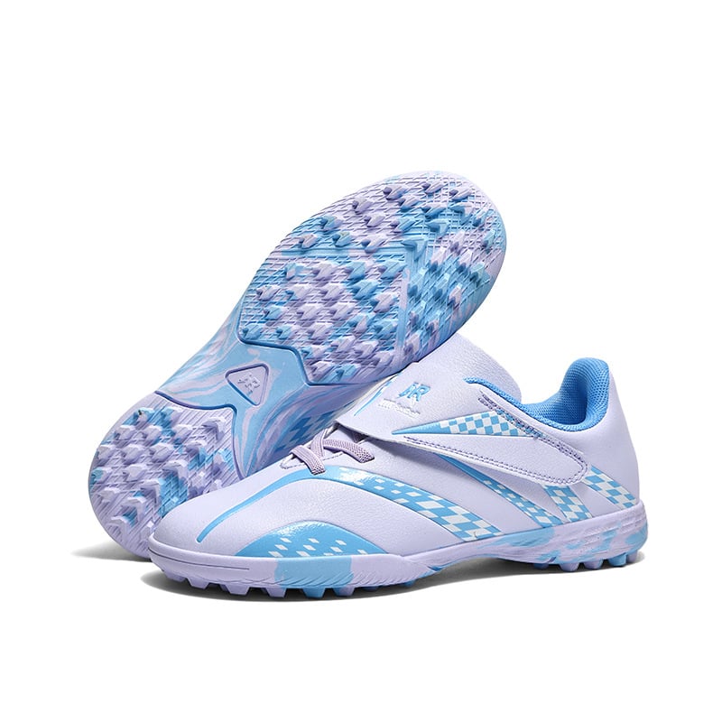 Παιδικά παπούτσια ποδοσφαίρου με Velcro κλείσιμο, επάνω μέρος από συνθετικό δέρμα, αναπνεύσιμη κατασκευή, αντιολισθητική σόλα από καουτσούκ, κατάλληλα για φυσικό και τεχνητό χλοοτάπητα.