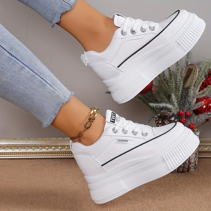 Raffia felsőrészes tornacipő, csíkos mintázat, gyapjú bélés, hintázó talp, sarokmagasság 0–1 cm