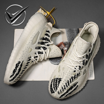 Férfi sportos szabadidőcipő, textil felsőrész, leopard mintás, lélegző belső talp, fűzős zárás