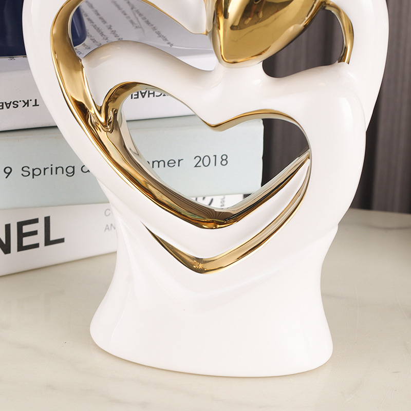 Porcelánová socha: abstraktný pár objímajúci sa - moderný minimalistický, geometrický dizajn