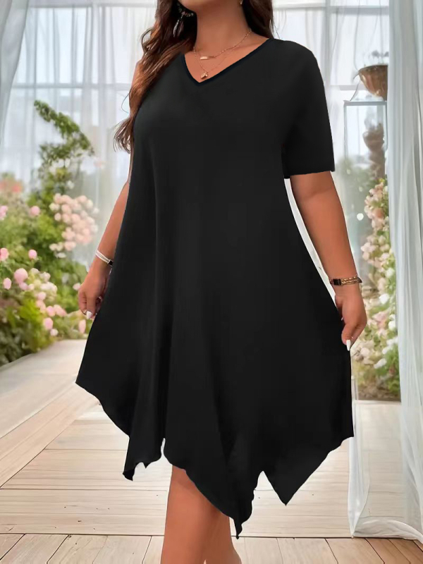 Šaty z pletenej tkaniny s okrúhlym výstrihom, strednej dĺžky s nepravidelným lemom, krátke rukávy, voľný pás.