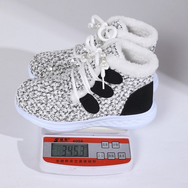 Női téli velúr magas szárú csizma műszőrme bélésével, elöl fűzőkkel, gumitalppal