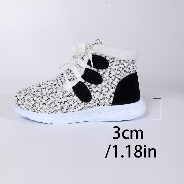 Női téli velúr magas szárú csizma műszőrme bélésével, elöl fűzőkkel, gumitalppal