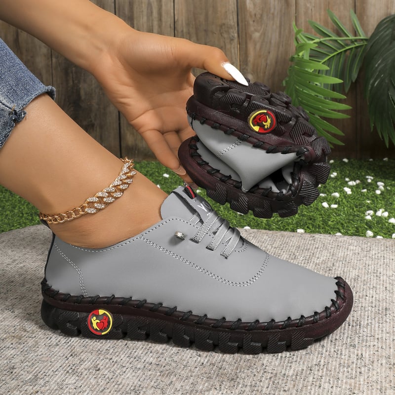 Uniszex lapos cipő kerek orral, PU felsőrész, gumírozott talp, elasztikus pánttal