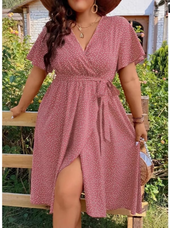 Rochie cu decolteu în V, croială în A de lungime medie, mâneci scurte, material poliester cu imprimeu în valuri