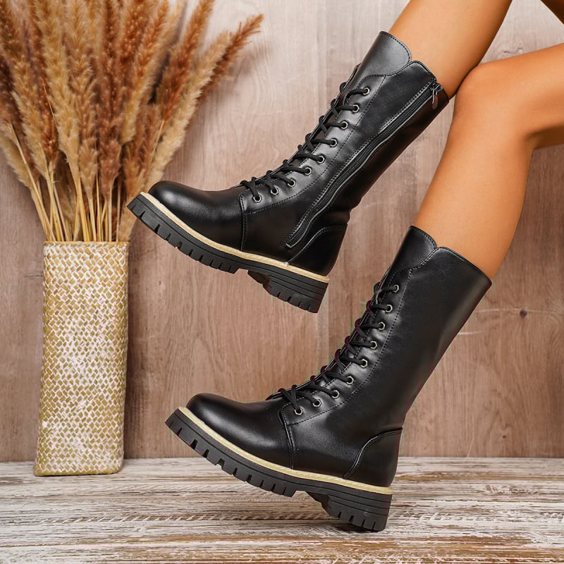 Женски ботуши Мартин: декоративни връзки, страничен цип, до средата на прасеца, водоустойчива гумена подметка, горна част изкуствена кожа