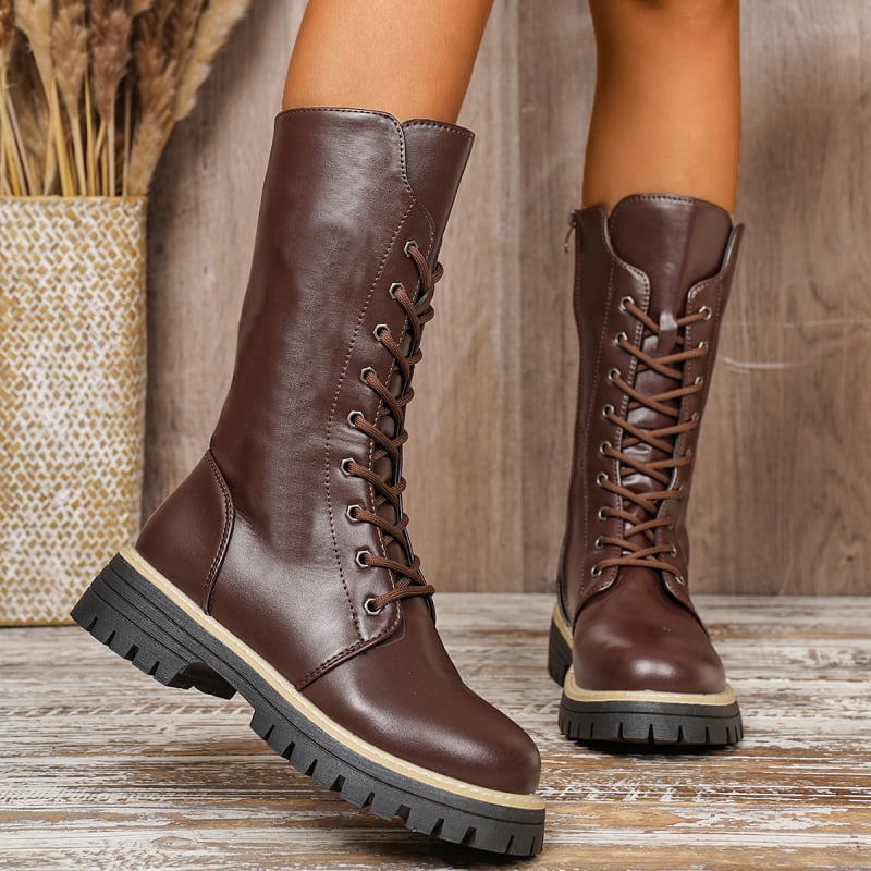 Женски ботуши Мартин: декоративни връзки, страничен цип, до средата на прасеца, водоустойчива гумена подметка, горна част изкуствена кожа