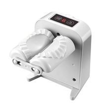 Automatický knedľovač pre domácu kuchyňu, moderný dizajn, prispôsobiteľný, uvedený na trh v roku 2023.