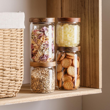 Oválny sklenený pohár s hermetickým uzáverom z borosilikátového skla, vhodný na zrná, kávové zrná a čajové listy