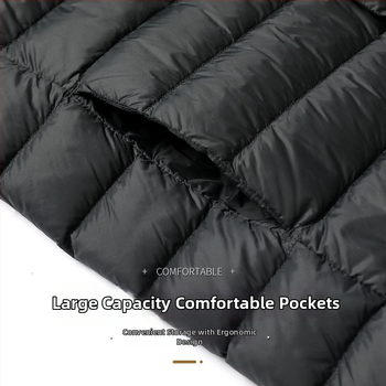 Vyriska pūkinė striukė – lengva žieminė, balta antis pūka (86–90%), 550 užpildymo galia, išorinis audinys nailonas/poliamidas 100%, pamušalas poliesteris 100%, siauras kirpimas