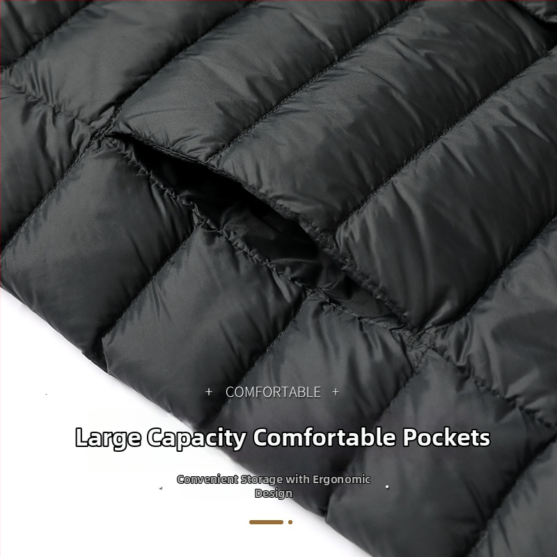 Vyriska pūkinė striukė – lengva žieminė, balta antis pūka (86–90%), 550 užpildymo galia, išorinis audinys nailonas/poliamidas 100%, pamušalas poliesteris 100%, siauras kirpimas