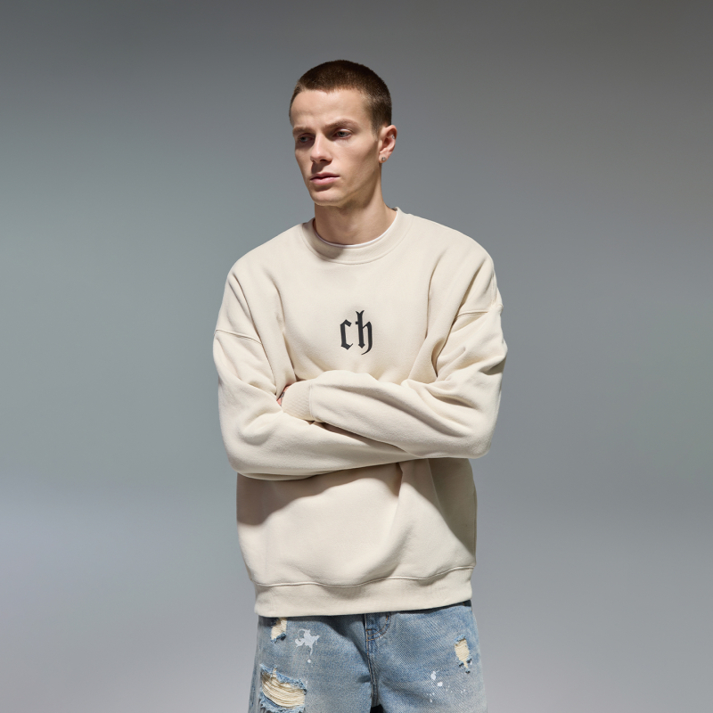 Pullover kampsun, trükkitud kiri-motiiv, pikkade varrukatega, polüester 81–90%, lõdva lõikega