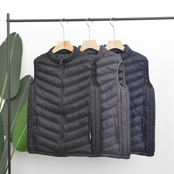 Pánska jesenná zimná bavlnená vesta s polyesterovým výplňou a podšívkou, stojací golier, hlavná tkanina polypropylén; vzory: prúžky, mriežka, jednofarebná, maskáň, bodky