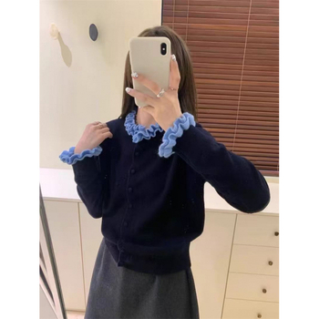 Cardigan tricotat cu guler rotund, croială lejeră, mâneci lungi, nasturi pe un rând, model cu blocuri