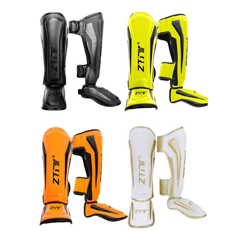 Chrániče holene Muay Thai, Sanda a boxu s priloženou obuvou — PU, vysoká pena, vertikálny štýl, profesionálna ochrana