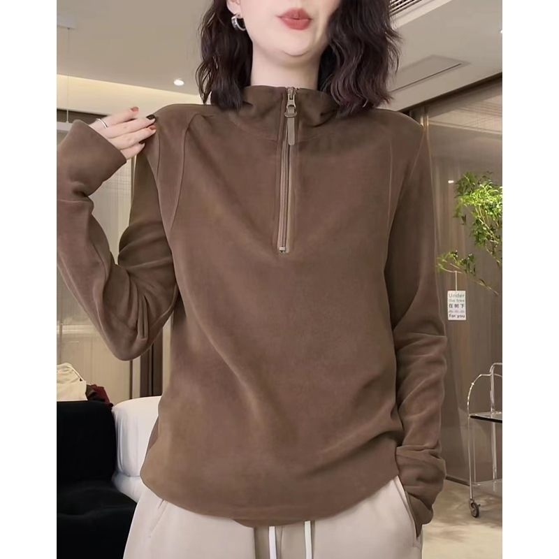 Ženski hoodie s patentnim zatvaranjem od German Terry materijala, stojeći ovratnik, dugi rukav, široki kroj, redovna duljina