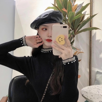 Viskoosist kudumispull poolkõrge kaelusega, slim lõige, pikad varrukad, ühtlane muster