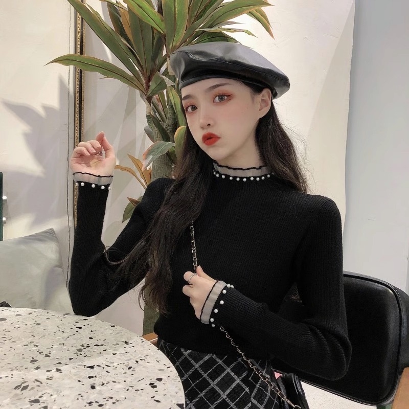 Viskoosist kudumispull poolkõrge kaelusega, slim lõige, pikad varrukad, ühtlane muster