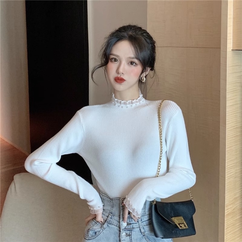 Viskoosist kudumispull poolkõrge kaelusega, slim lõige, pikad varrukad, ühtlane muster