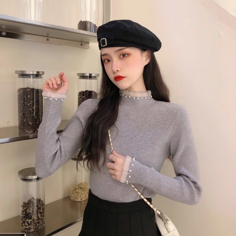 Viskoosist kudumispull poolkõrge kaelusega, slim lõige, pikad varrukad, ühtlane muster