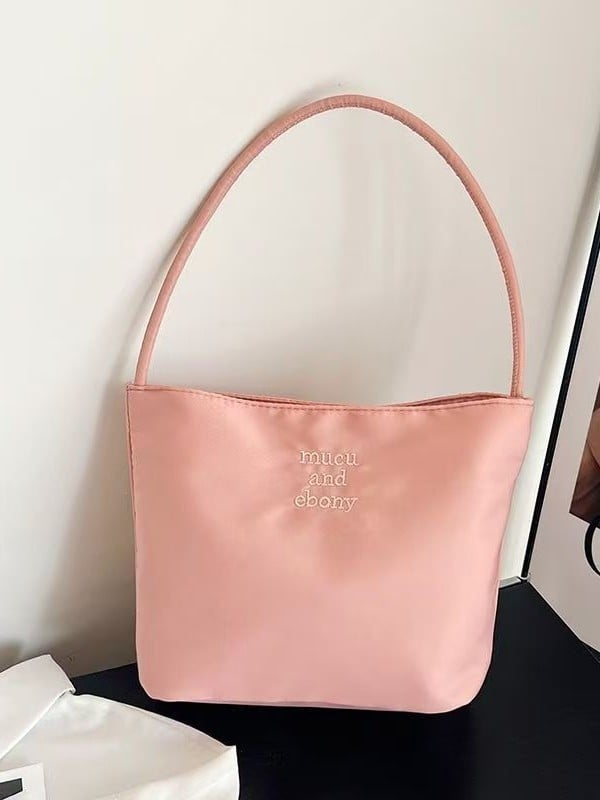 PU anyagú válltáska, vödör alakú, mágneses zár, nylon bélés, belső cipzáras rekesz