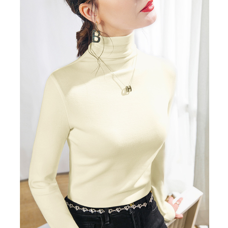 Női póló modal kötött anyagból, hosszú ujjú, félmagas gallér, karcsú szabás