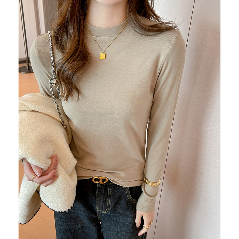 Viszkózszálból készült felső, álló gallérral, hosszú ujjú, normál hosszúságú