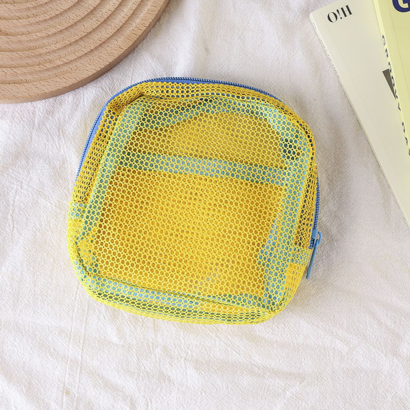 Meigikott nailon- ja polüestrist võrgustruktuuriga, kuubikujulise vormi, mitmekülgne, reisidele ja igapäevaseks kasutamiseks