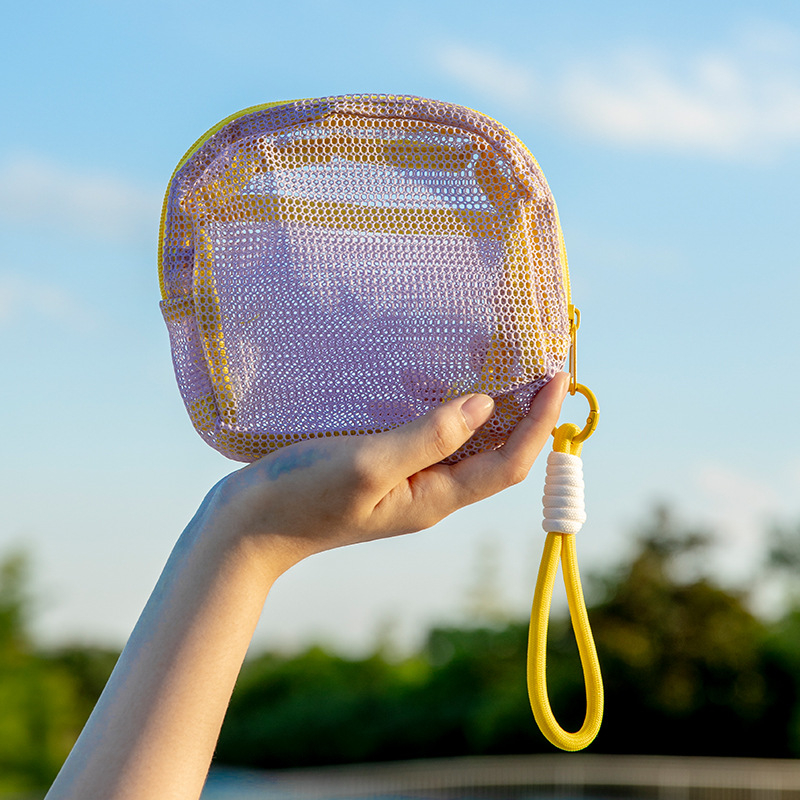 Meigikott nailon- ja polüestrist võrgustruktuuriga, kuubikujulise vormi, mitmekülgne, reisidele ja igapäevaseks kasutamiseks