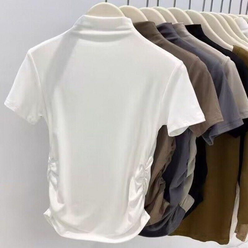 T-särk puuvillase-modaalise segu, kitsas lõige, V-kaelus, ühes toonis, pikkus 50–65 cm