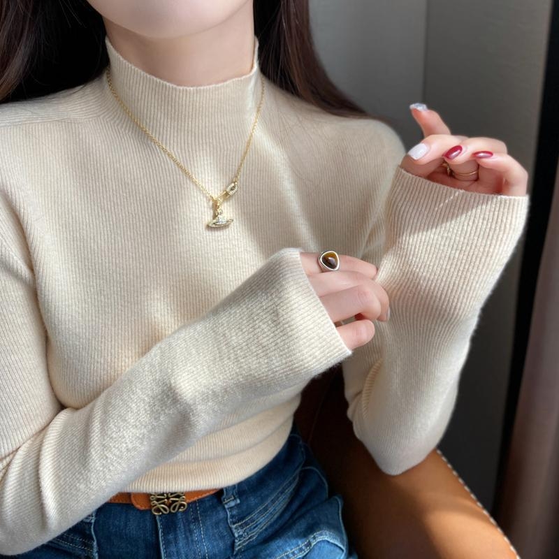 Villane kudumispull, kits lõige, poolkõrge kaelus, pikad varrukad, abstraktne muster