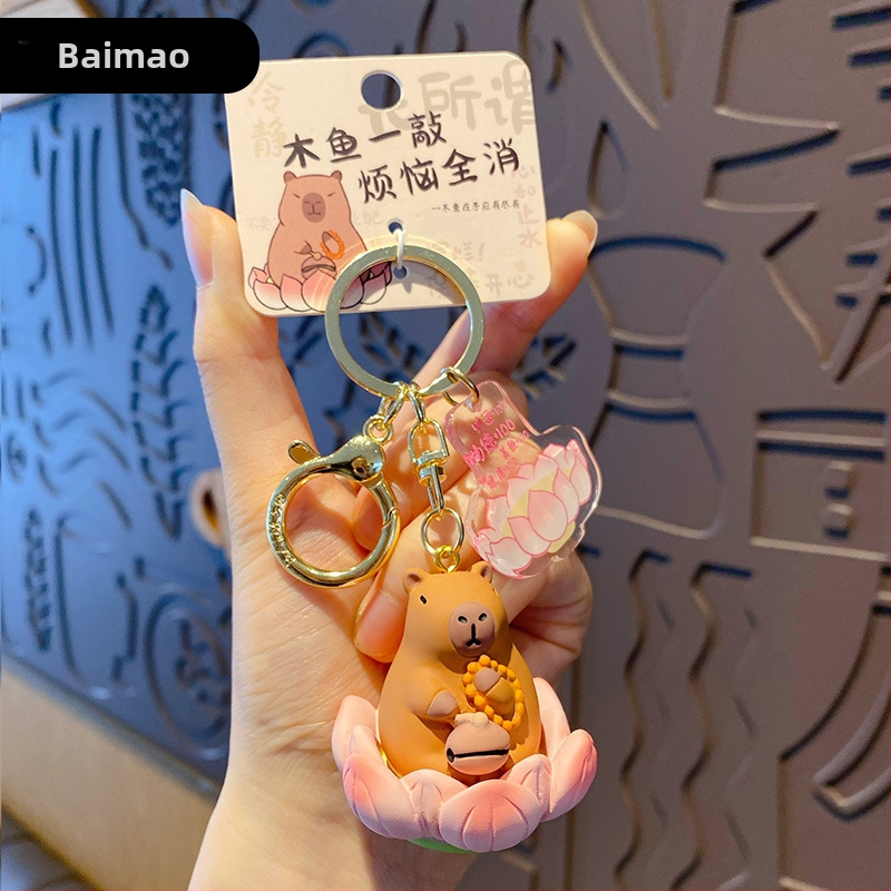 Capybara prívesok na kľúče – živica, kreslený štýl Buddha-Lotus séria, samostatné balenie