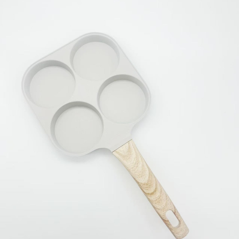 Panvica na vajíčka a hamburgery so štyrmi dierkami – hliníková zliatina, nelepivý povrch, dizajn so štyrmi dierkami, hmotnosť 0,48 kg, kompatibilný s plynovým sporákom