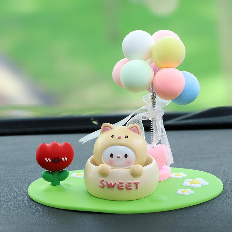 Roztomilá ozdoba do auta s kývajúcou hlavou na uvoľnenie, ozdoba z živice pre interiér auta a stôl