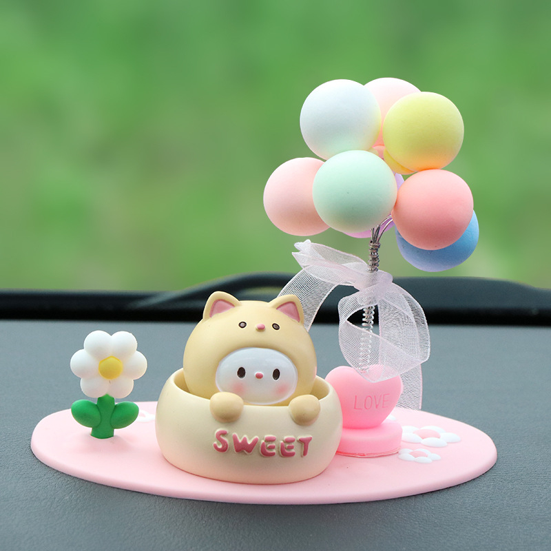 Roztomilá ozdoba do auta s kývajúcou hlavou na uvoľnenie, ozdoba z živice pre interiér auta a stôl