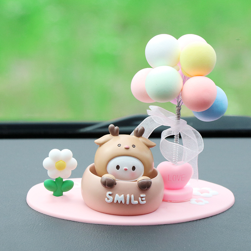 Roztomilá ozdoba do auta s kývajúcou hlavou na uvoľnenie, ozdoba z živice pre interiér auta a stôl