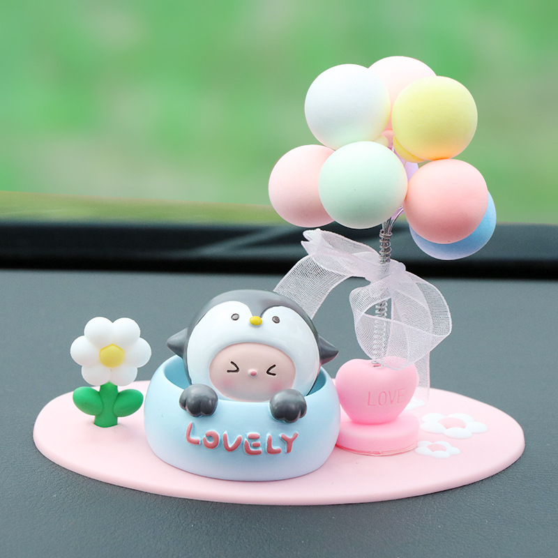 Roztomilá ozdoba do auta s kývajúcou hlavou na uvoľnenie, ozdoba z živice pre interiér auta a stôl