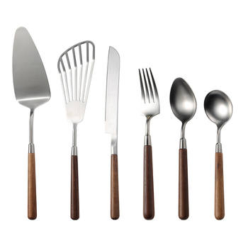 304 nerezovej ocele západné jedlá s orechovým držadlom, leštený povrch. Obsahuje: nôž, vidlica, lyžica, lopatka na tortu, nô na chlieb, motýľová lopatka, malá lyžička