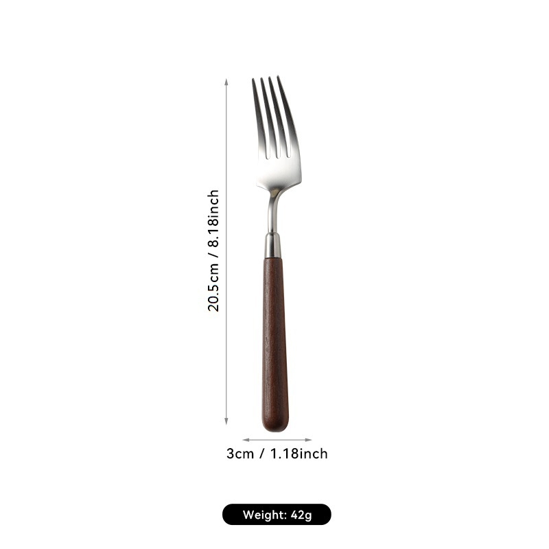 304 nerezovej ocele západné jedlá s orechovým držadlom, leštený povrch. Obsahuje: nôž, vidlica, lyžica, lopatka na tortu, nô na chlieb, motýľová lopatka, malá lyžička