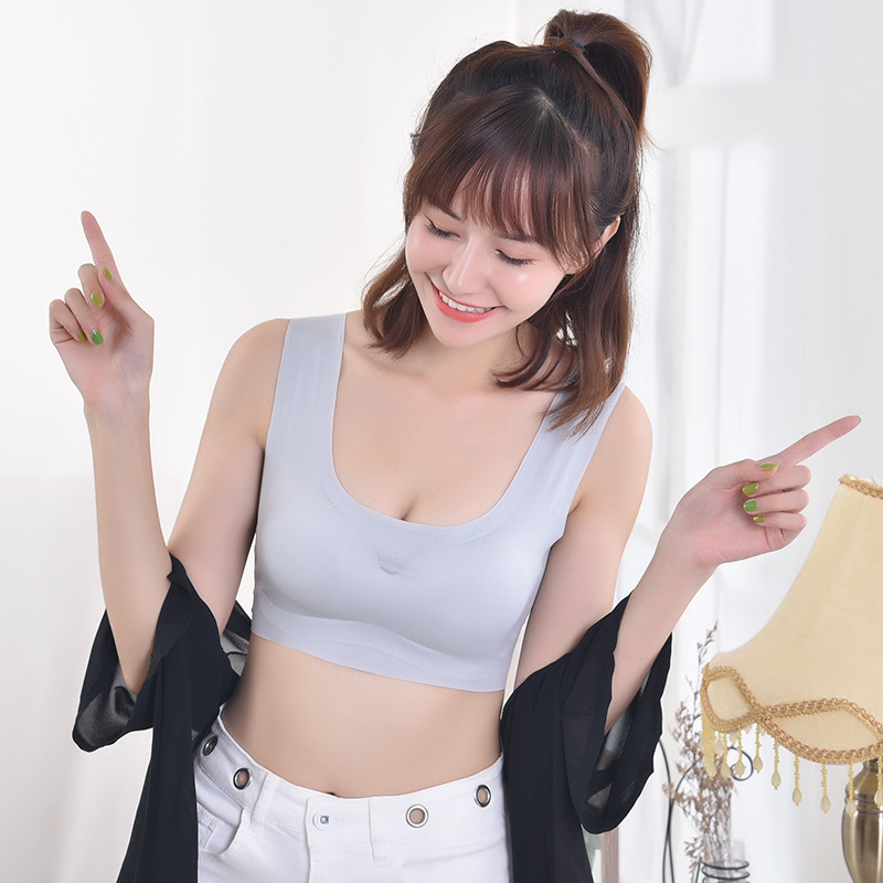 Szőrés nélküli, vezeték nélküli push-up sportmelltartó mellény-stílusban, formázott kosarakkal; külső anyag nylon 70–80%, bélés elasztán 25%, acélgyűrű nélkül