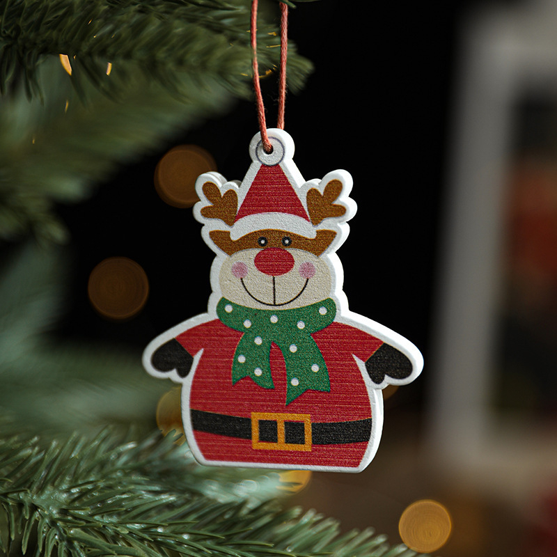 Drevená karikatúrna ozdoba Santa Clausa so snehovou vločkou – scénické vianočné dekorácie