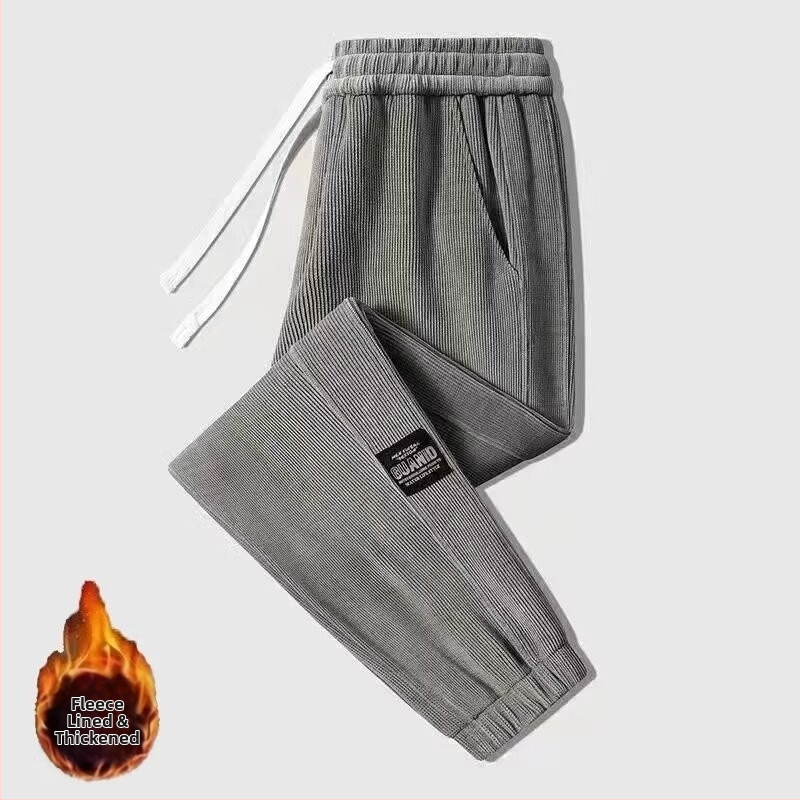 Pánske zimné nohavice z corduroy s fleecovou vnútornou vrstvou, stredný pás, šnúrkové zapínanie, rovný strih, športovo voľno
