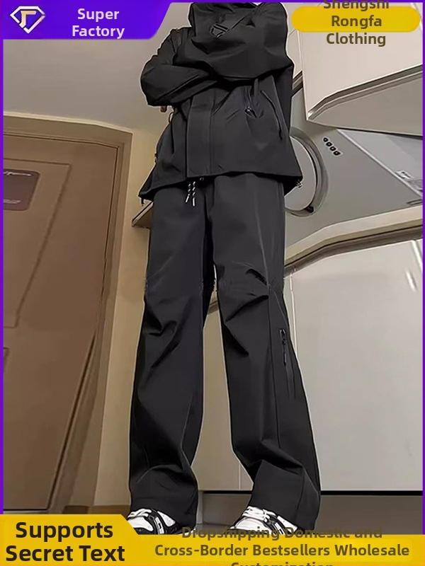 Turistické nohavice do prírody – nepremokavé, funkčné, voľný strih s širokými rovnými nohami, zapínanie na šnúrku, 100% polyester