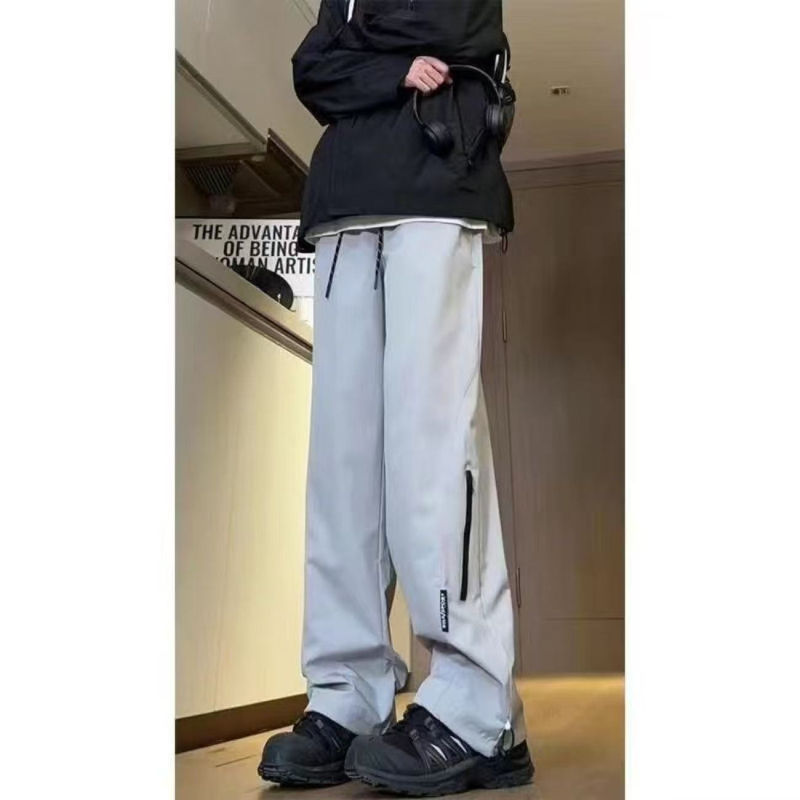 Turistické nohavice do prírody – nepremokavé, funkčné, voľný strih s širokými rovnými nohami, zapínanie na šnúrku, 100% polyester