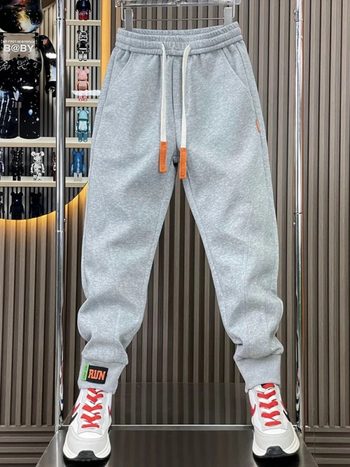 Pánske voľnočasové športové nohavice v štýle Kórejčanov, voľný strih, stredný pás, polyester, zapínanie šnúrkou