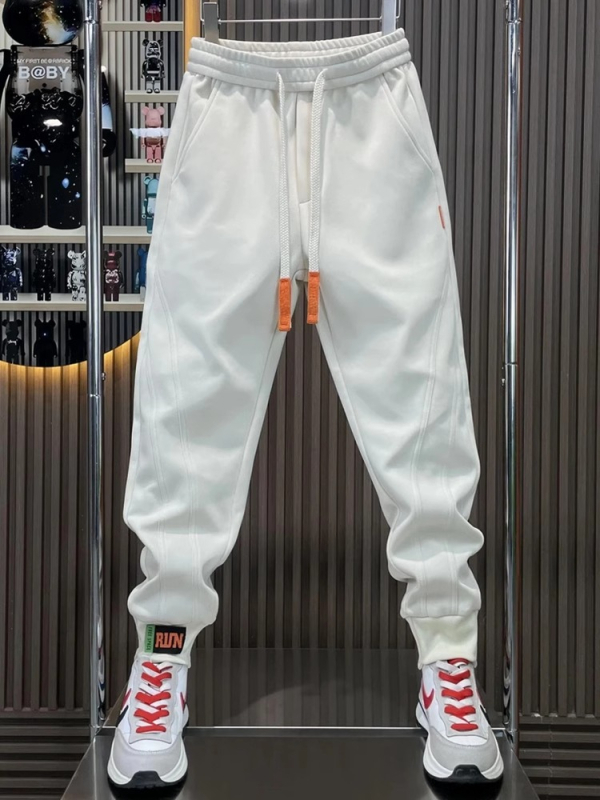 Pánske voľnočasové športové nohavice v štýle Kórejčanov, voľný strih, stredný pás, polyester, zapínanie šnúrkou