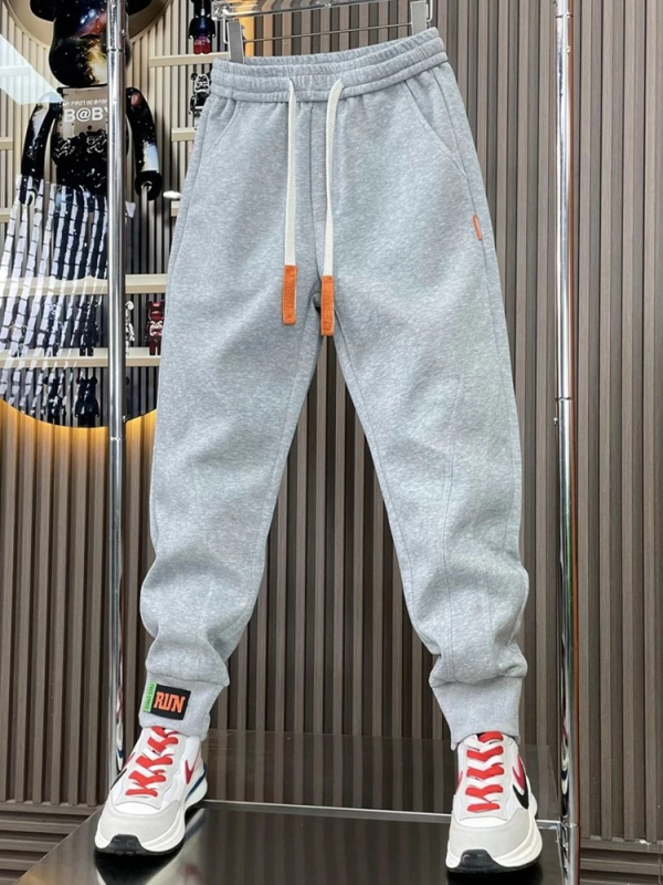 Pánske voľnočasové športové nohavice v štýle Kórejčanov, voľný strih, stredný pás, polyester, zapínanie šnúrkou